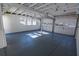 Spacious garage with painted floor and ample storage at 1080 Willow Bnd, Roswell, GA 30075