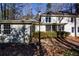 Rear view of house showing exterior and landscaping at 1080 Willow Bnd, Roswell, GA 30075