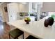 White quartz kitchen island with seating for two at 1080 Willow Bnd, Roswell, GA 30075