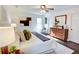 Main bedroom with hardwood floors, a ceiling fan, and modern decor at 1080 Willow Bnd, Roswell, GA 30075