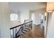 Elegant staircase with dark wood and metal railing at 1080 Willow Bnd, Roswell, GA 30075