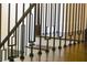 Close up of the modern metal balusters and dark hardwood stairs at 1080 Willow Bnd, Roswell, GA 30075