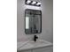 Bathroom with modern vanity, black fixtures, and a large mirror at 205 Hardman Way, Woodstock, GA 30188