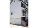 Two-car garage with white doors and a concrete driveway at 205 Hardman Way, Woodstock, GA 30188