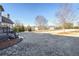 Backyard view with a fenced lawn and open space extending from a deck area at 2602 Alcovy Club Dr, Dacula, GA 30019