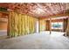 Unfinished basement area with exposed insulation, framing, and utilities, ready for customization at 2602 Alcovy Club Dr, Dacula, GA 30019