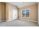 Bedroom with carpet, a large window with window blinds, and a closet at 2602 Alcovy Club Dr, Dacula, GA 30019