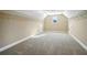 Large walk-in closet with neutral walls, carpet, and adjustable shelving at 2602 Alcovy Club Dr, Dacula, GA 30019