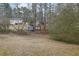 Large backyard with mature trees and shed at 2925 Fern Valley Sw Dr, Marietta, GA 30008