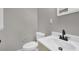 Simple bathroom with neutral walls and new vanity at 2925 Fern Valley Sw Dr, Marietta, GA 30008