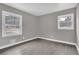 Well-lit bedroom with hardwood floors and neutral walls at 2925 Fern Valley Sw Dr, Marietta, GA 30008