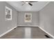 Bright bedroom with gray walls, wood-look floors, and large windows at 2925 Fern Valley Sw Dr, Marietta, GA 30008