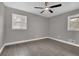 Spacious bedroom with hardwood floors and ceiling fan at 2925 Fern Valley Sw Dr, Marietta, GA 30008