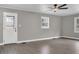 Spacious living room with hardwood floors and neutral paint at 2925 Fern Valley Sw Dr, Marietta, GA 30008