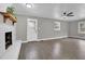 Bright living room featuring hardwood floors, fireplace and neutral walls at 2925 Fern Valley Sw Dr, Marietta, GA 30008