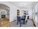 Elegant dining room with hardwood floors, classic wainscoting, and stylish chandelier at 3901 Old Atlanta Station Se Dr, Atlanta, GA 30339