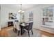 Bright dining room with hardwood floors and elegant chandelier at 3901 Old Atlanta Station Se Dr, Atlanta, GA 30339