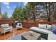 Cozy outdoor patio with comfortable seating and wooded views at 3901 Old Atlanta Station Se Dr, Atlanta, GA 30339