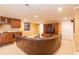 Finished basement with a wet bar and seating area at 5412 Wild Flower Ct, Powder Springs, GA 30127