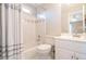 Clean bathroom with a bathtub, toilet and vanity at 5412 Wild Flower Ct, Powder Springs, GA 30127