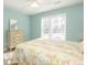 Bright bedroom with a double bed and built-in dresser at 5412 Wild Flower Ct, Powder Springs, GA 30127