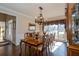 Formal dining room with hardwood floors and chandelier at 5412 Wild Flower Ct, Powder Springs, GA 30127