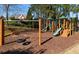 Wooden playground structure with tire swing at 5412 Wild Flower Ct, Powder Springs, GA 30127