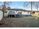 Home's back elevation, showcasing a deck and backyard at 1573 Newton Se Ave, Atlanta, GA 30316