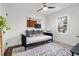 Cozy bedroom with daybed, wood floors, and ceiling fan at 1573 Newton Se Ave, Atlanta, GA 30316