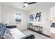 Bedroom with daybed, wood floors, and modern art at 1573 Newton Se Ave, Atlanta, GA 30316