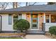 Modern front door with a glass panel and stylish landscaping at 1573 Newton Se Ave, Atlanta, GA 30316