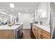 Modern kitchen with a large island, stainless steel appliances and shaker cabinets at 1573 Newton Se Ave, Atlanta, GA 30316