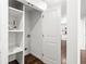 Bright laundry room with shelving and white cabinetry at 1573 Newton Se Ave, Atlanta, GA 30316