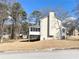 House exterior showcasing a screened porch and backyard at 3581 Drum Roll Ln, Snellville, GA 30039