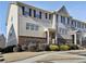 Well-maintained townhouse exterior with a combination of siding and brick accents at 3898 High Dove Sw Way # 12, Smyrna, GA 30082