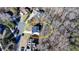 Aerial view of the home and surrounding property, located in a beautiful neighborhood at 7650 Abbey Glen Dr, Cumming, GA 30028