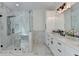 Modern bathroom with marble shower, sleek vanity, and contemporary fixtures for a spa-like experience at 7650 Abbey Glen Dr, Cumming, GA 30028