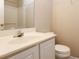 Simple bathroom with a vanity, toilet, and shower/tub combo at 740 Abbotts Mill Ct, Johns Creek, GA 30097