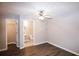 Bedroom with a ceiling fan, walk-in closet and private bathroom at 740 Abbotts Mill Ct, Johns Creek, GA 30097
