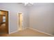 Bedroom with private bathroom access and neutral wall colors at 740 Abbotts Mill Ct, Johns Creek, GA 30097
