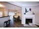 Elegant dining room with hardwood floors and fireplace at 740 Abbotts Mill Ct, Johns Creek, GA 30097