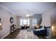 Comfortable living room with hardwood floors and fireplace at 740 Abbotts Mill Ct, Johns Creek, GA 30097