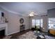 Spacious living room with fireplace and hardwood floors at 740 Abbotts Mill Ct, Johns Creek, GA 30097