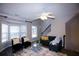 Living room boasts hardwood floors and a cozy fireplace at 740 Abbotts Mill Ct, Johns Creek, GA 30097
