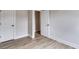 Simple bedroom with light walls and wood-look flooring at 458 Florence Rd, Douglasville, GA 30134