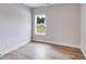 Bright bedroom featuring wood-look floors and a window at 458 Florence Rd, Douglasville, GA 30134