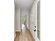 Bright entryway with hardwood floors and view to living room at 458 Florence Rd, Douglasville, GA 30134