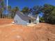 Craftsman style home with gray siding and stone accents at 458 Florence Rd, Douglasville, GA 30134