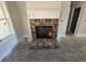 Brick fireplace with a white mantel at 458 Florence Rd, Douglasville, GA 30134