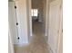 Bright hallway with white walls and doors at 458 Florence Rd, Douglasville, GA 30134